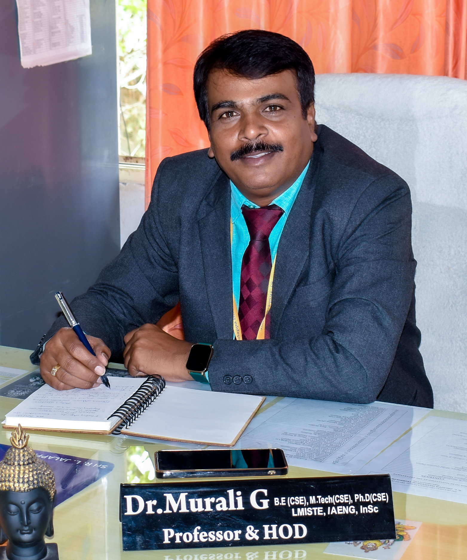 Dr. Murali G